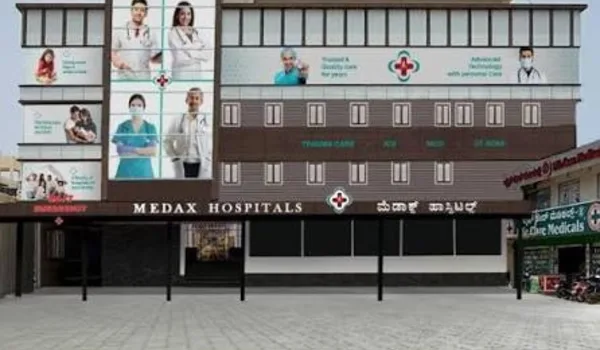 Medax Hospitals, Gottigere, Bannerghatta Road, Bangalore — hospital frontage with the Medax Hospitals name in English and Kannada above the entrance canopy